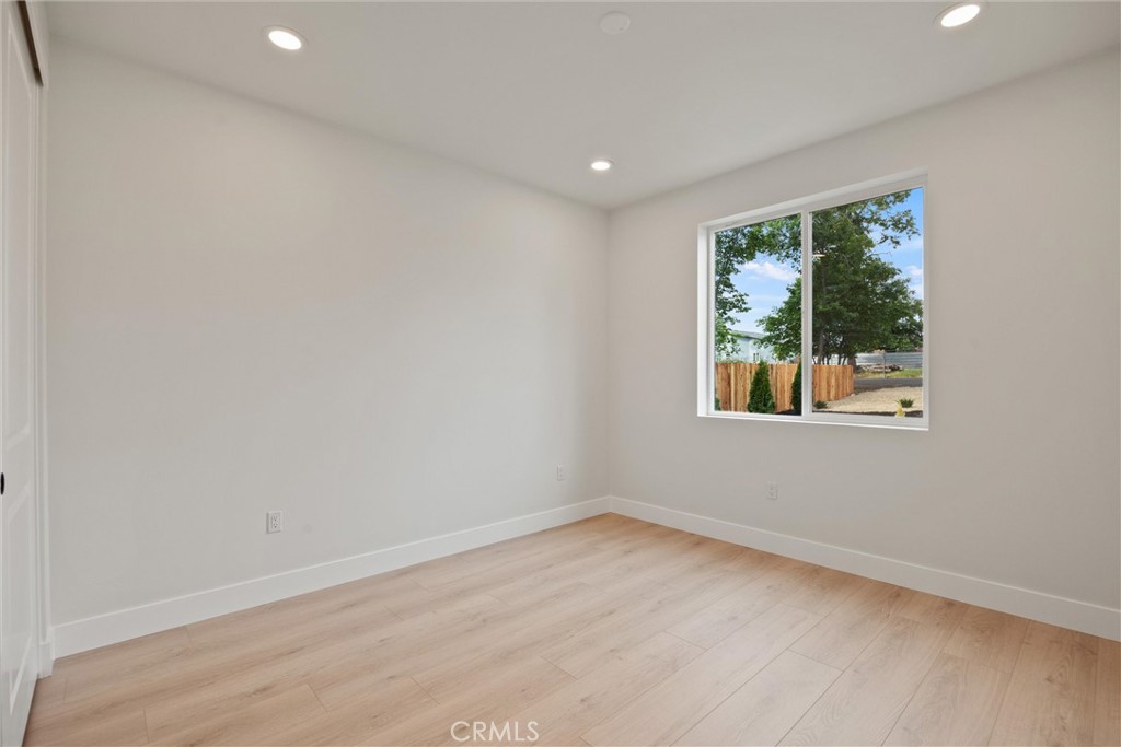 6006 Kibler Road Paradise, CA 95969 - Photo 31 of 43 wooden floor in an empty room with a window