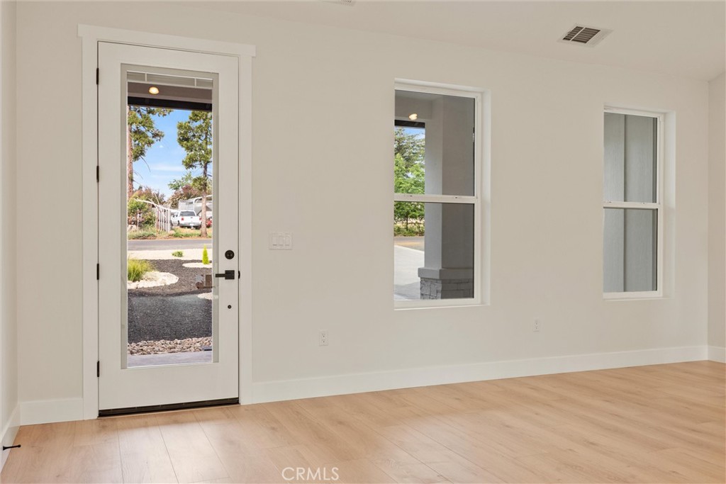 6006 Kibler Road Paradise, CA 95969 - Photo 7 of 43 an empty room with windows and entrance