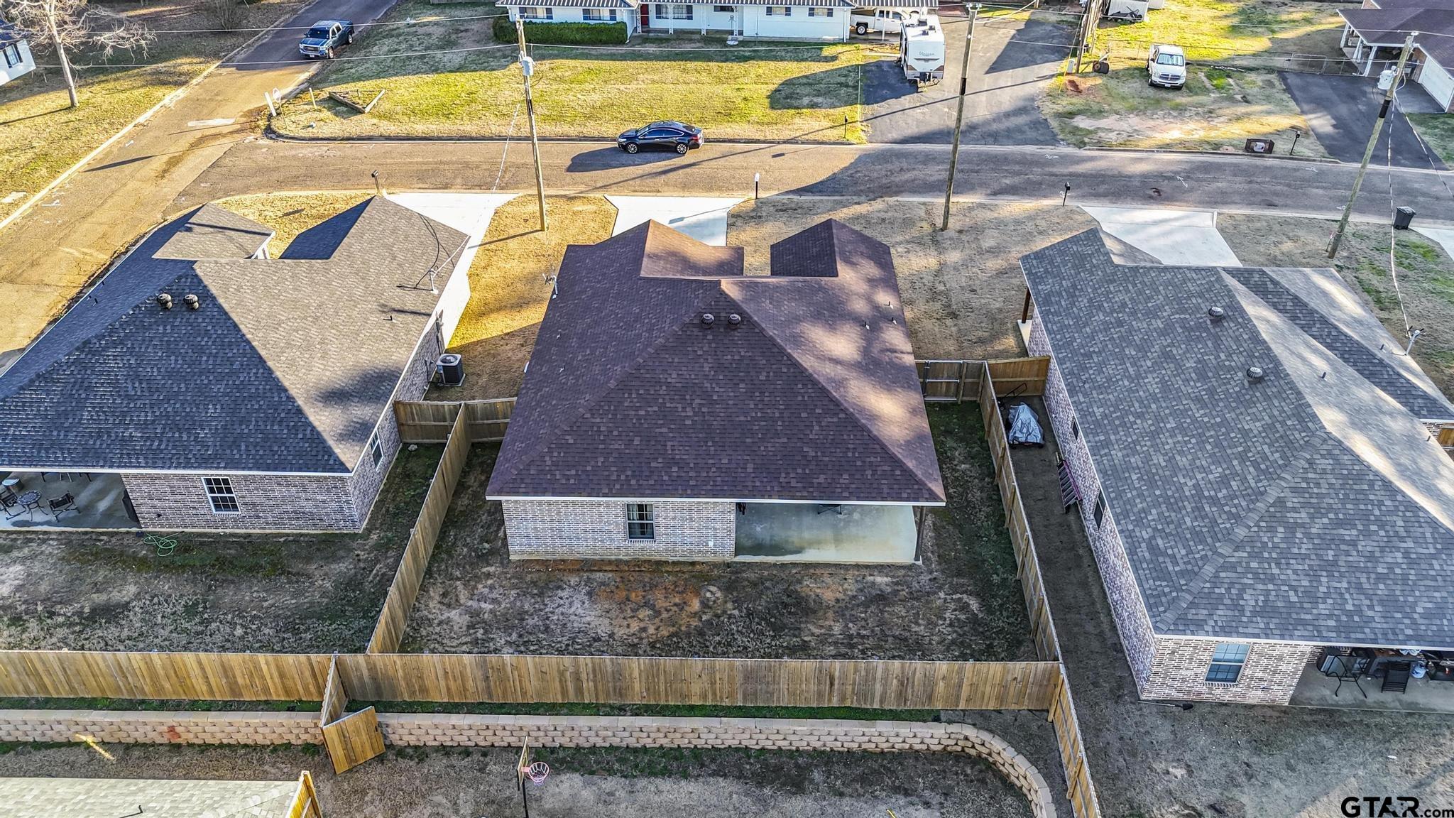 107 Short Street Gilmer, TX 75645 - Photo 2 of 26 swimming pool view with a outdoor seating space