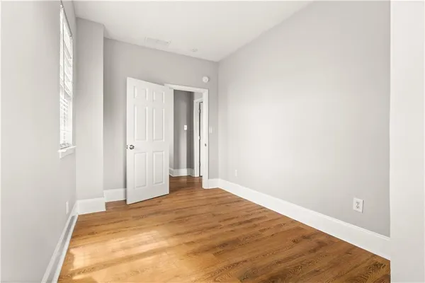 an empty room with windows