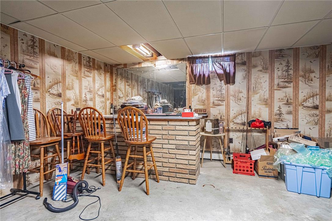579 Cherry Road Northampton, PA 18067 - Photo 38 of 57 A retro-inspired basement bar area offers a fun spot for entertaining.