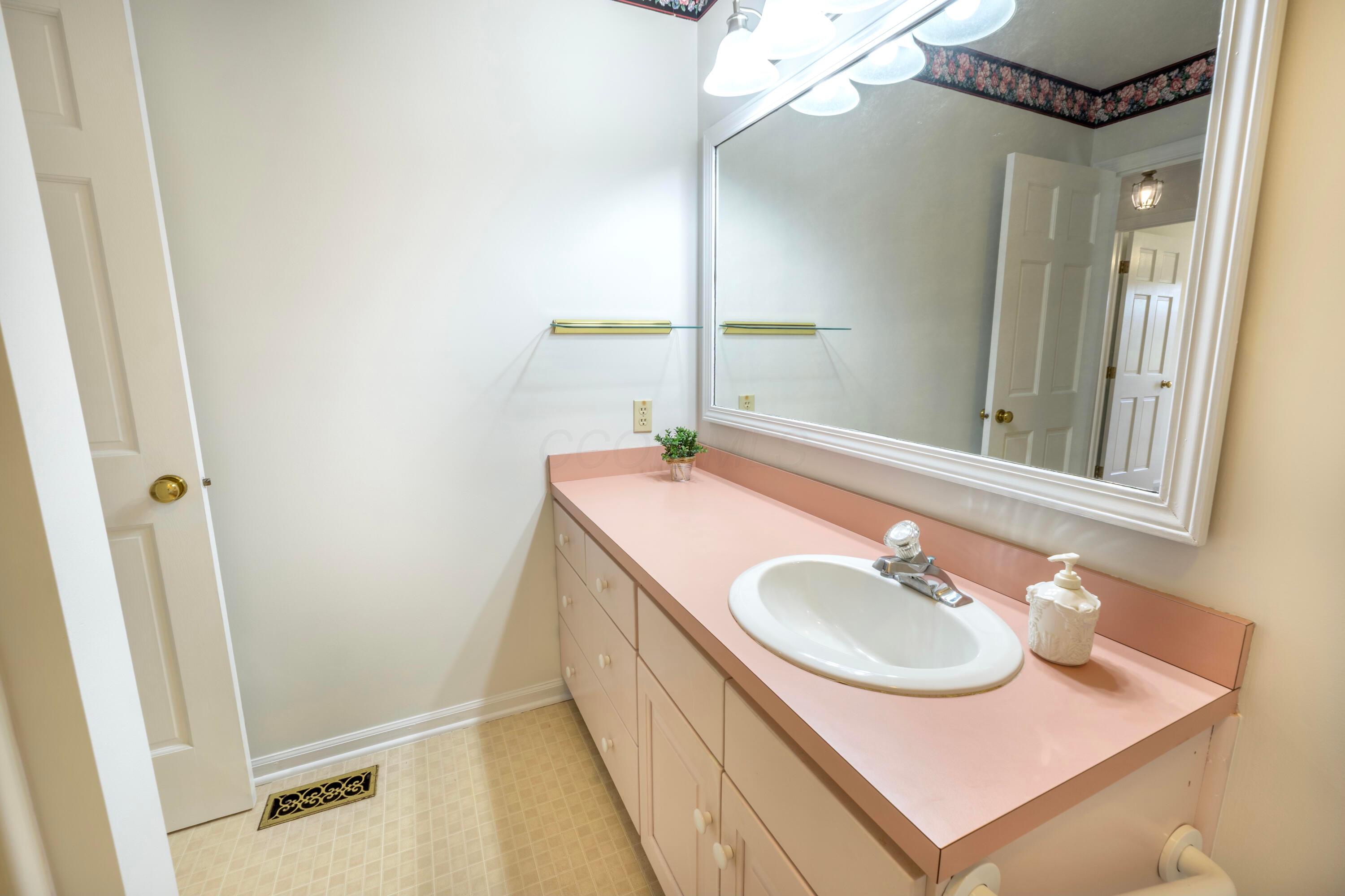3880 Fry Road Ostrander, OH 43061 - Photo 39 of 82 Nice large mirror and plenty of counter space.