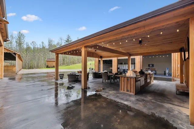 a bed room with a bed and a chandelier