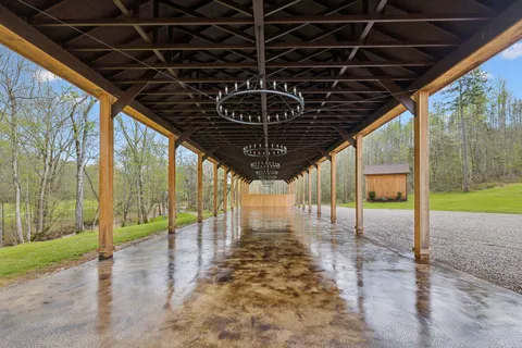 a view of a yard with an outdoor space