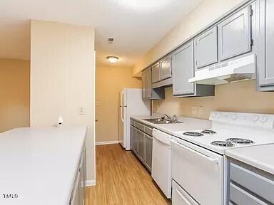 2020 Quaker Landing, Unit 102 Raleigh, NC 27603 - Photo 9 of 20 Kitchen1