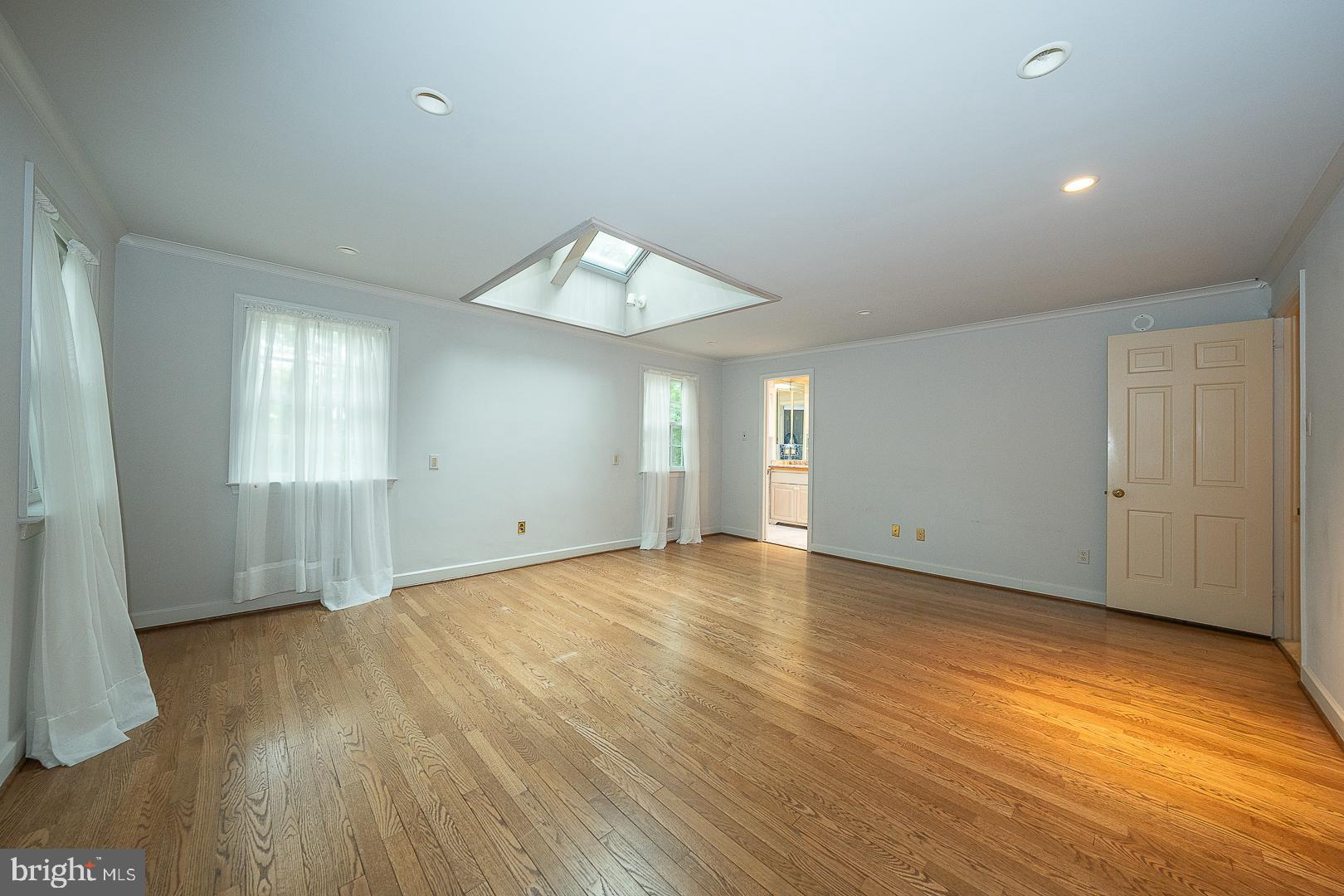 577 Tory Hill Road Devon, PA 19333 - Photo 23 of 63 Primary Bedroom w/ Hardwood Flooring and Skylight