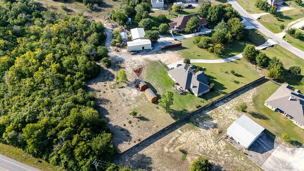 5965 Feather Wind Way Fort Worth, TX 76135 - Photo 33 of 35 an aerial view of a house with a yard