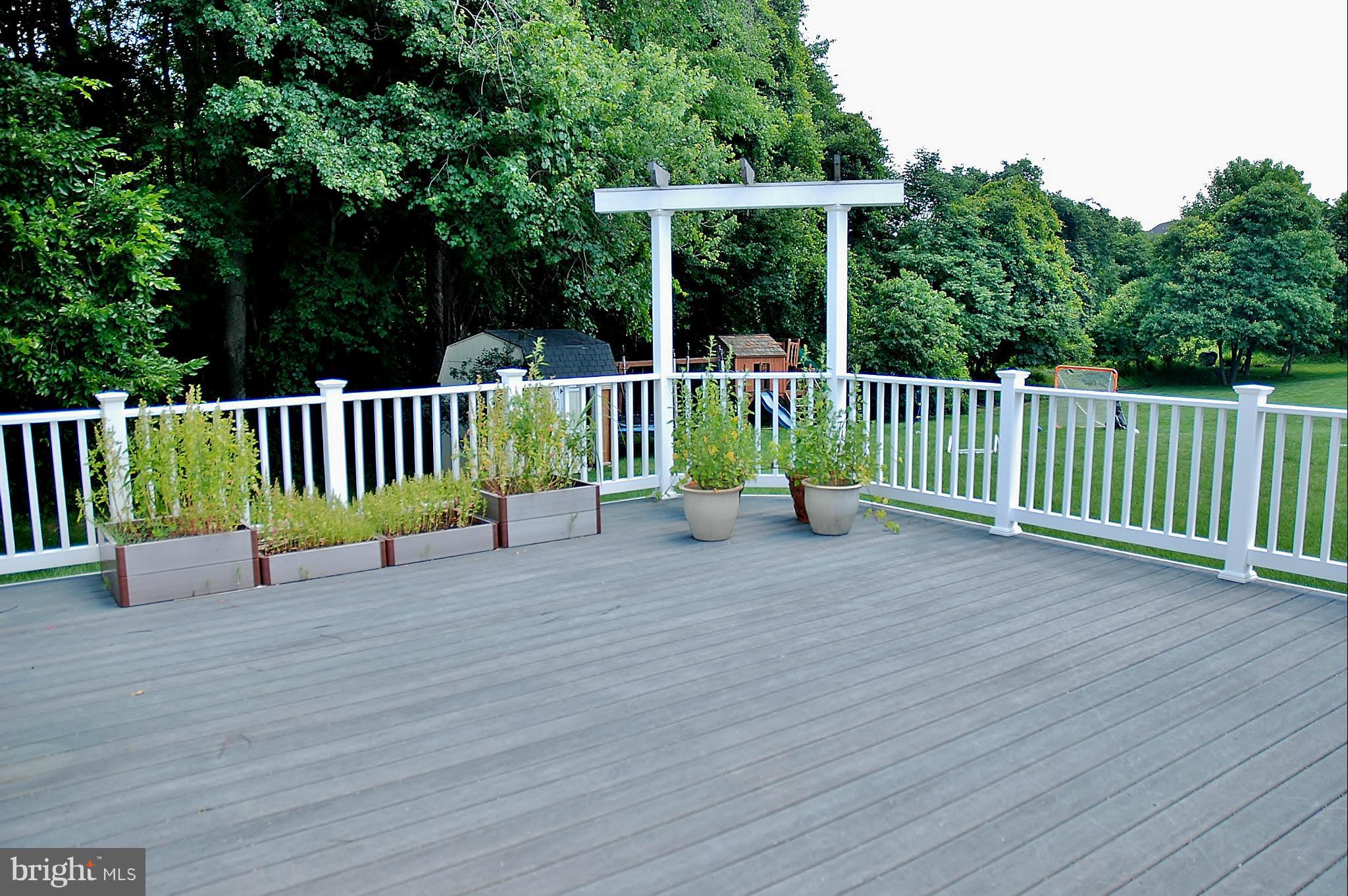 18256 Wickham Road Olney, MD 20832 - Photo 21 of 30 Deck off Sunroom backs to woods