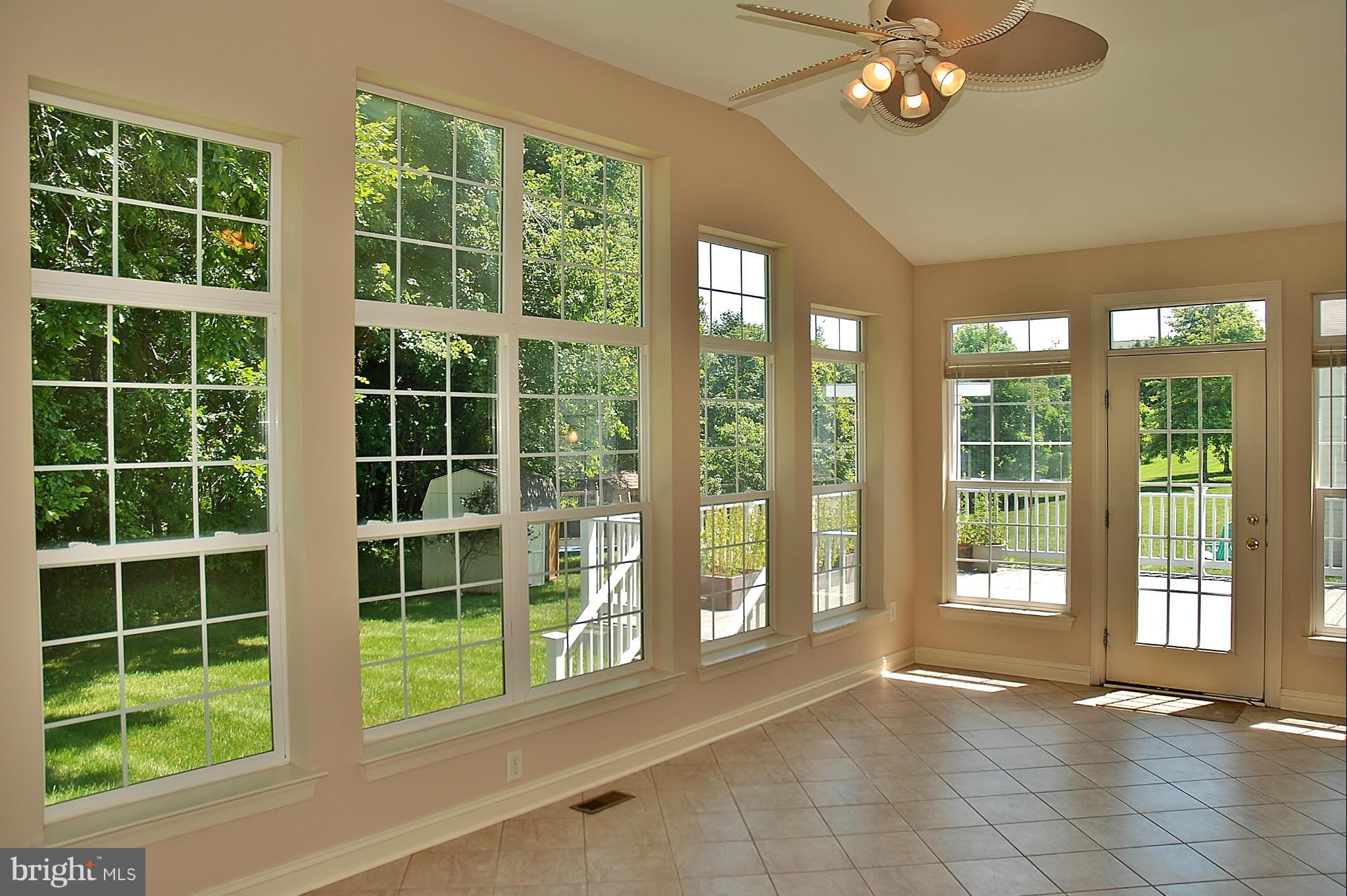 18256 Wickham Road Olney, MD 20832 - Photo 10 of 30 Ceramic Tile in Sunroom with Wooded views