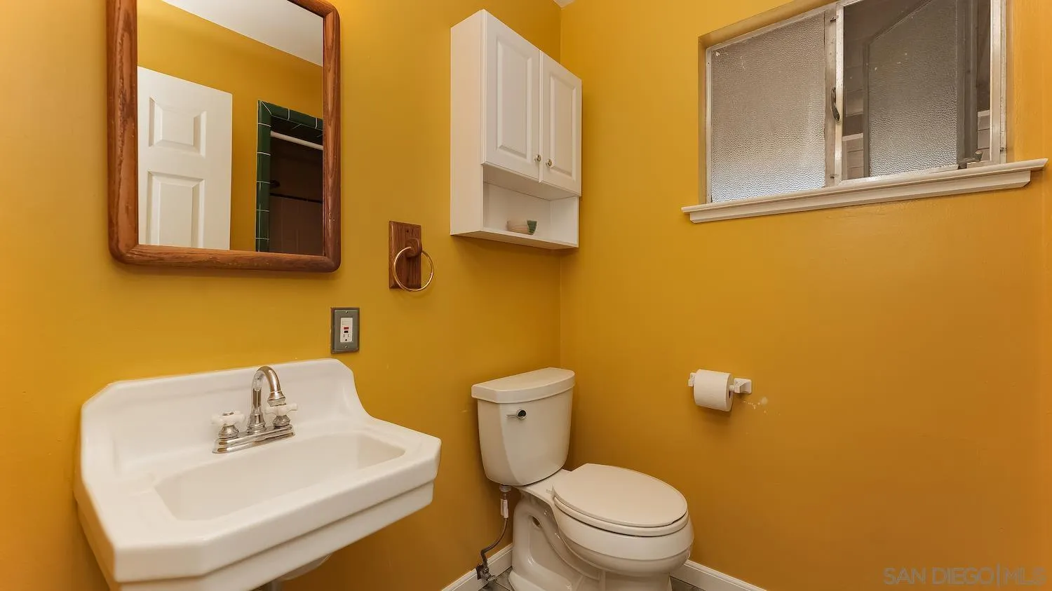 1003 Tiger Tail Road Vista, CA 92084 - Photo 15 of 22 a bathroom with a sink and a toilet