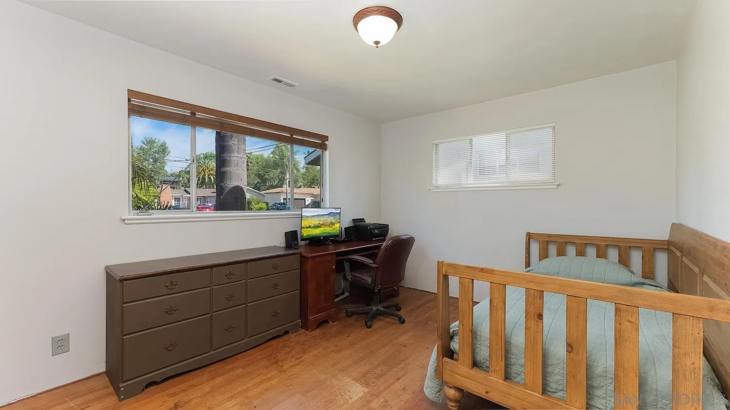 1003 Tiger Tail Road Vista, CA 92084 - Photo 16 of 22 a bedroom with furniture and a window