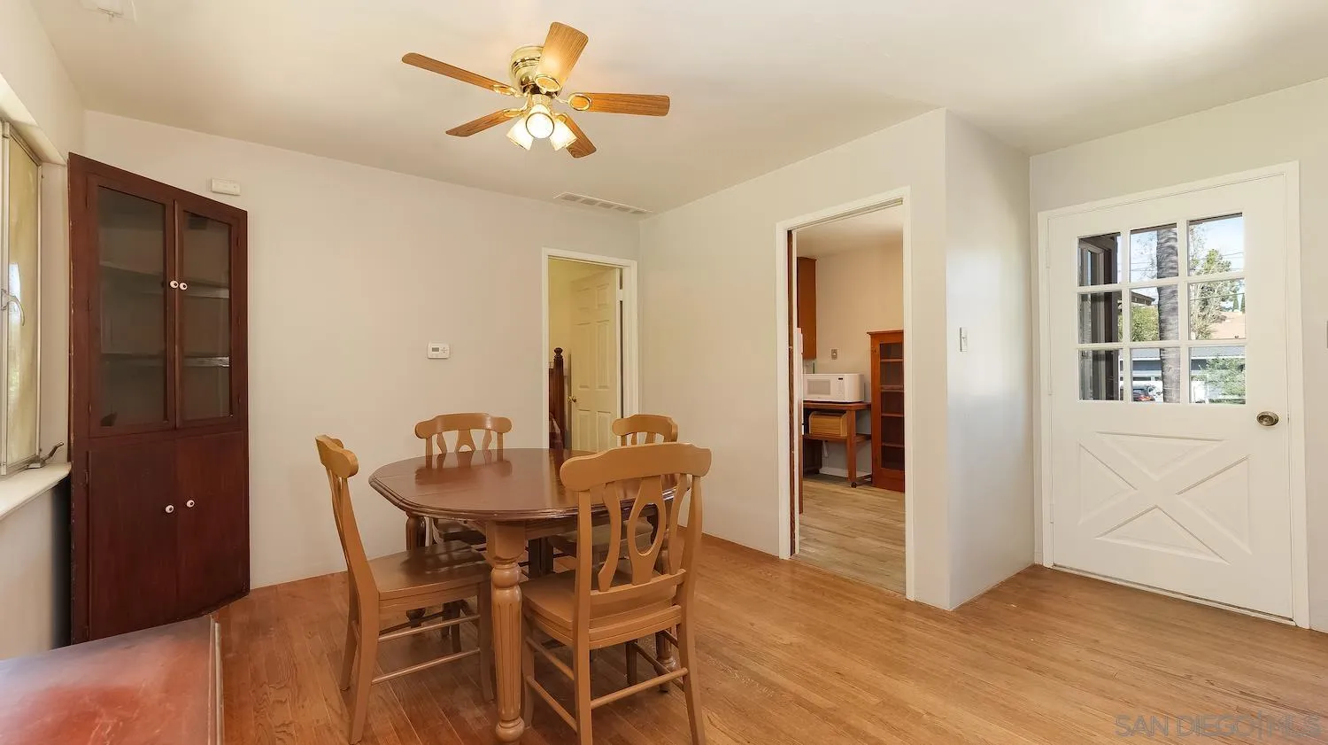 1003 Tiger Tail Road Vista, CA 92084 - Photo 3 of 22 a dining room with furniture and window
