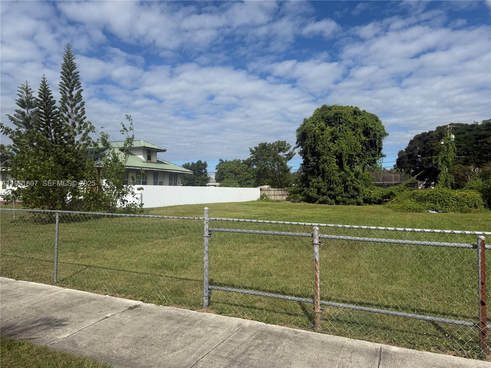 0 Northwest 19th Street Homestead, FL 33030 - Photo 1 of 5 a view of a golf course with a lake
