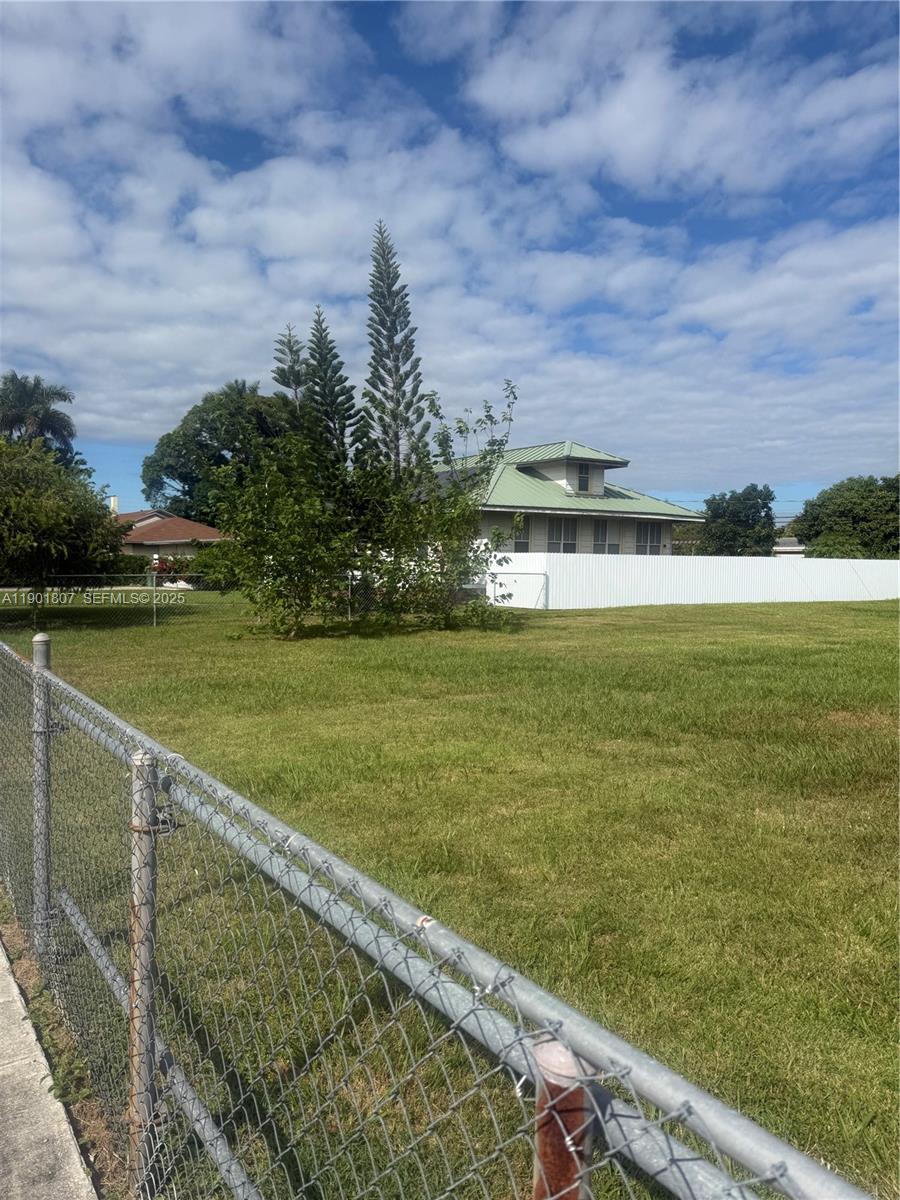 0 Northwest 19th Street Homestead, FL 33030 - Photo 5 of 5 a view of a lake with a city view