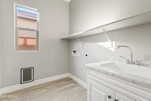 a living room with furniture and garden view