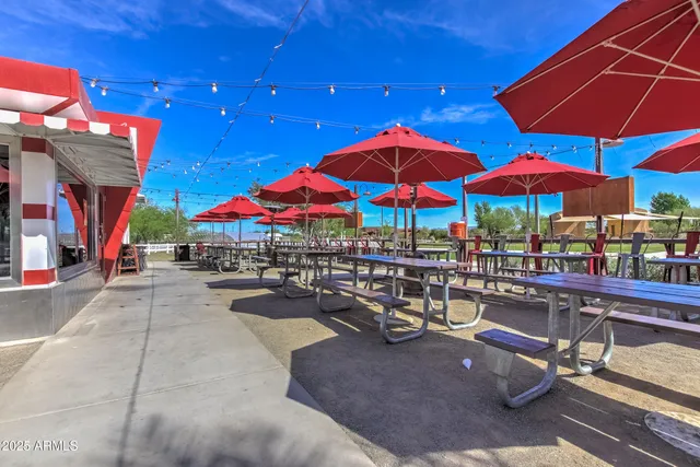 an outdoor space with seating space and patio