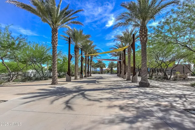 a view of a park with sitting area