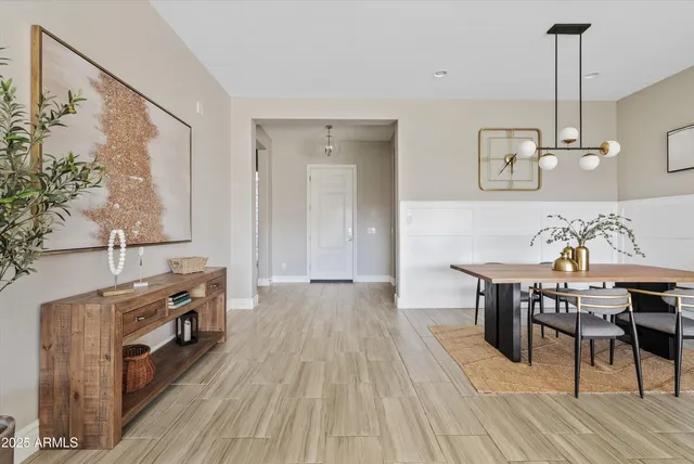 a view of a table and chairs in the room