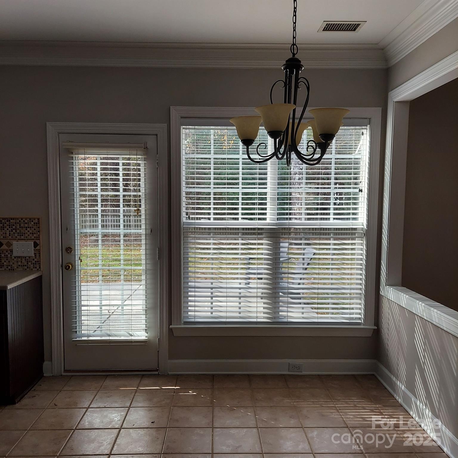 10820 Knight Castle Drive Charlotte, NC 28277 - Photo 15 of 35 a view of empty room with windows