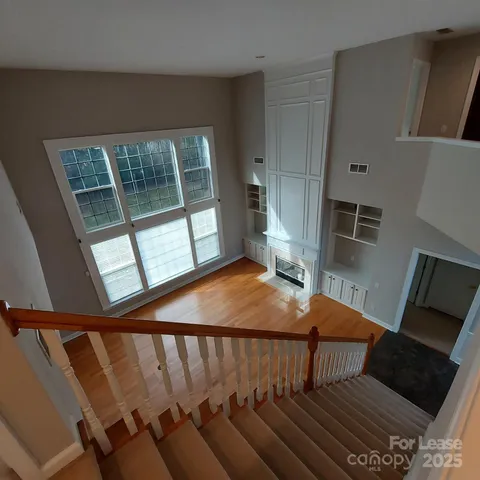 a view of entryway with wooden floor