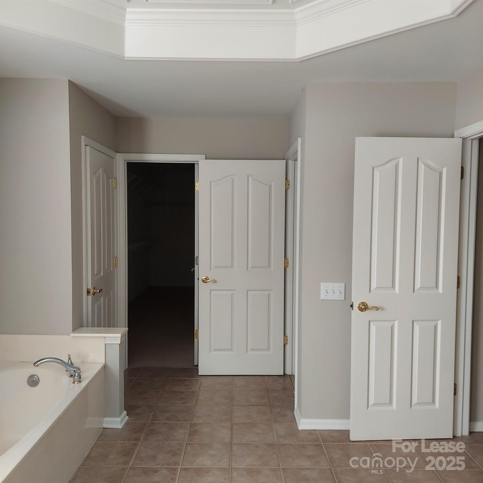 10820 Knight Castle Drive Charlotte, NC 28277 - Photo 25 of 35 a bathroom with a bathtub and a shower