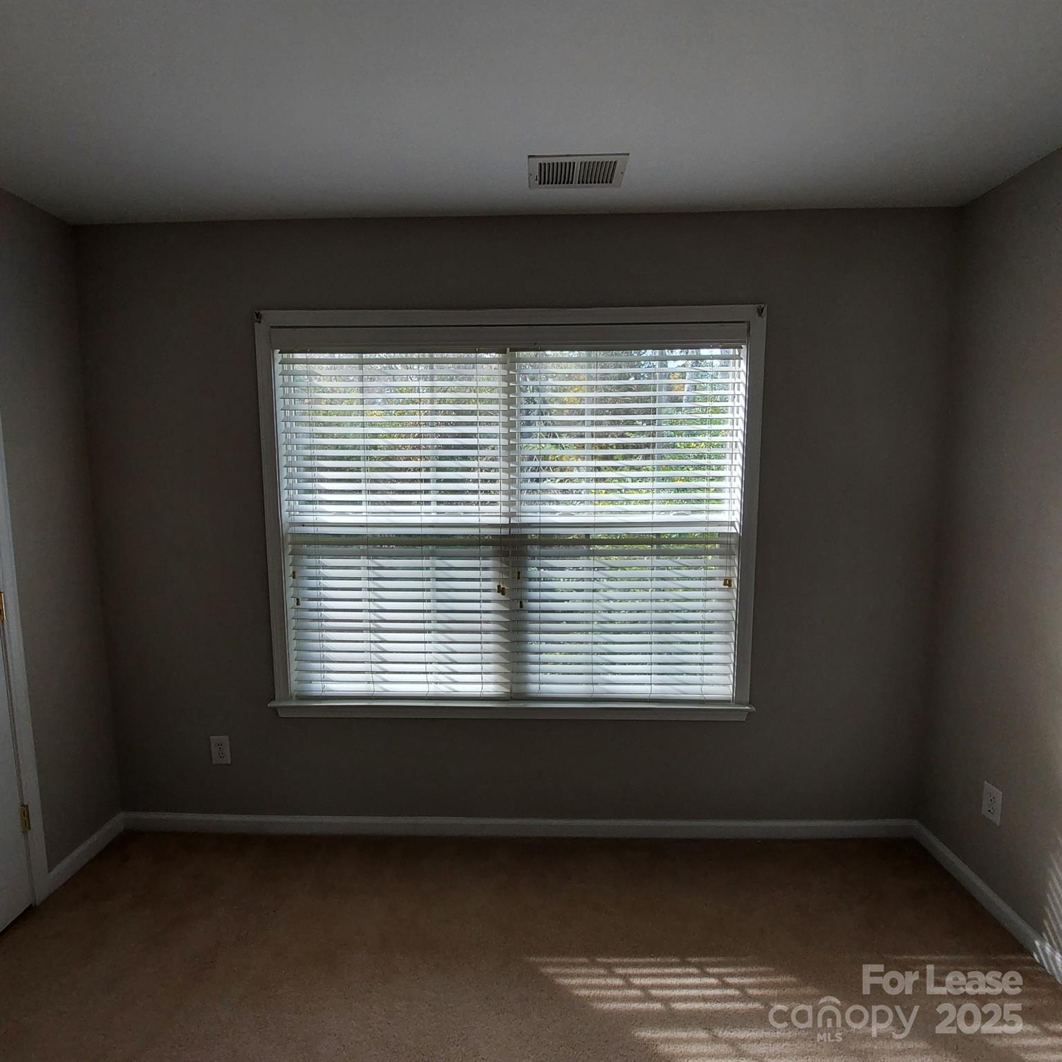10820 Knight Castle Drive Charlotte, NC 28277 - Photo 26 of 35 a view of an empty room with a window