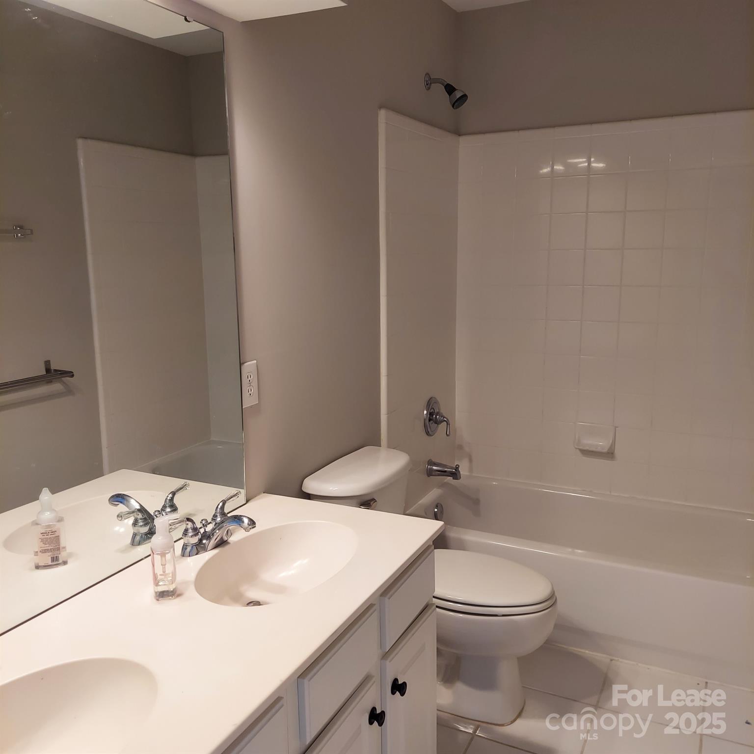 10820 Knight Castle Drive Charlotte, NC 28277 - Photo 27 of 35 a bathroom with a sink toilet and shower