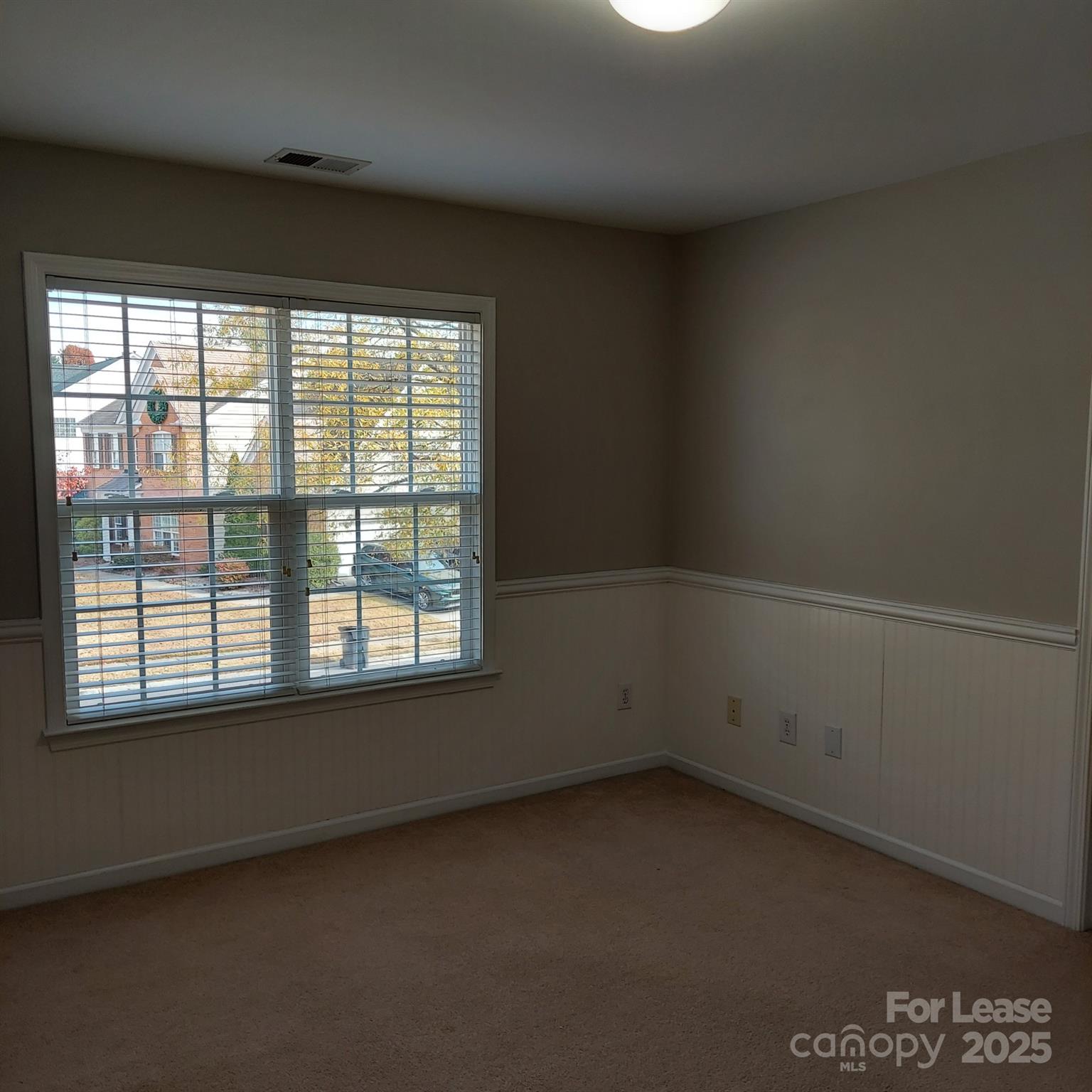 10820 Knight Castle Drive Charlotte, NC 28277 - Photo 32 of 35 an empty room with a window