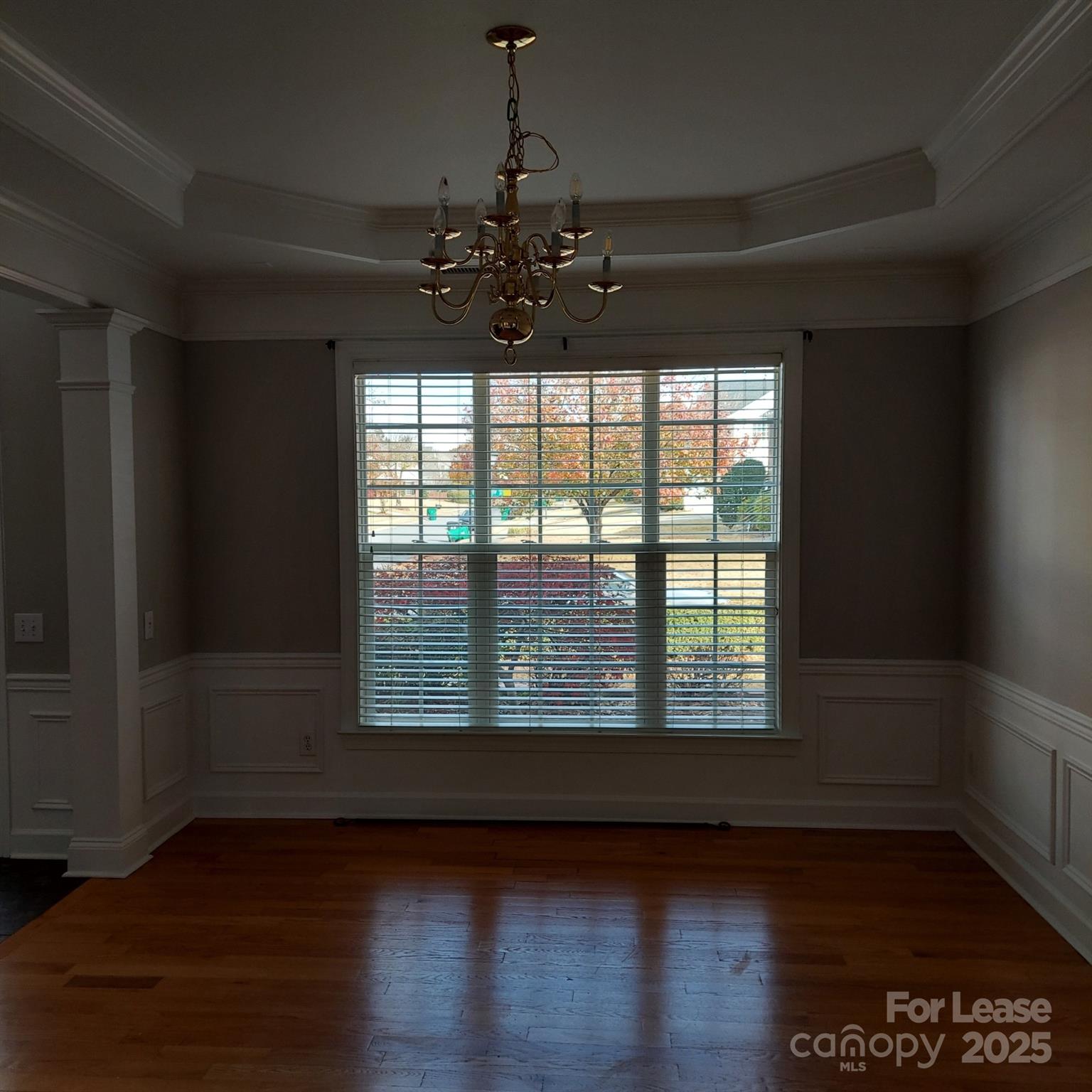 10820 Knight Castle Drive Charlotte, NC 28277 - Photo 6 of 35 a view of a livingroom with wooden floor and a window