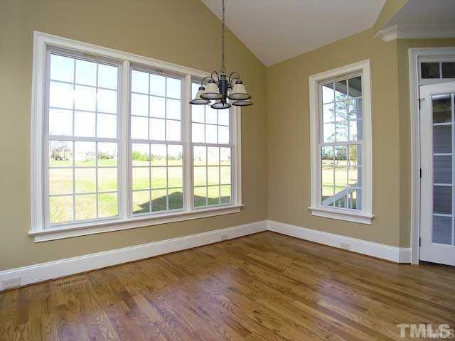 305 Woodlief Farm Road Rolesville, NC 27571 - Photo 7 of 25 Nook leads to covered back porch and fenced back yard Breakfast nook