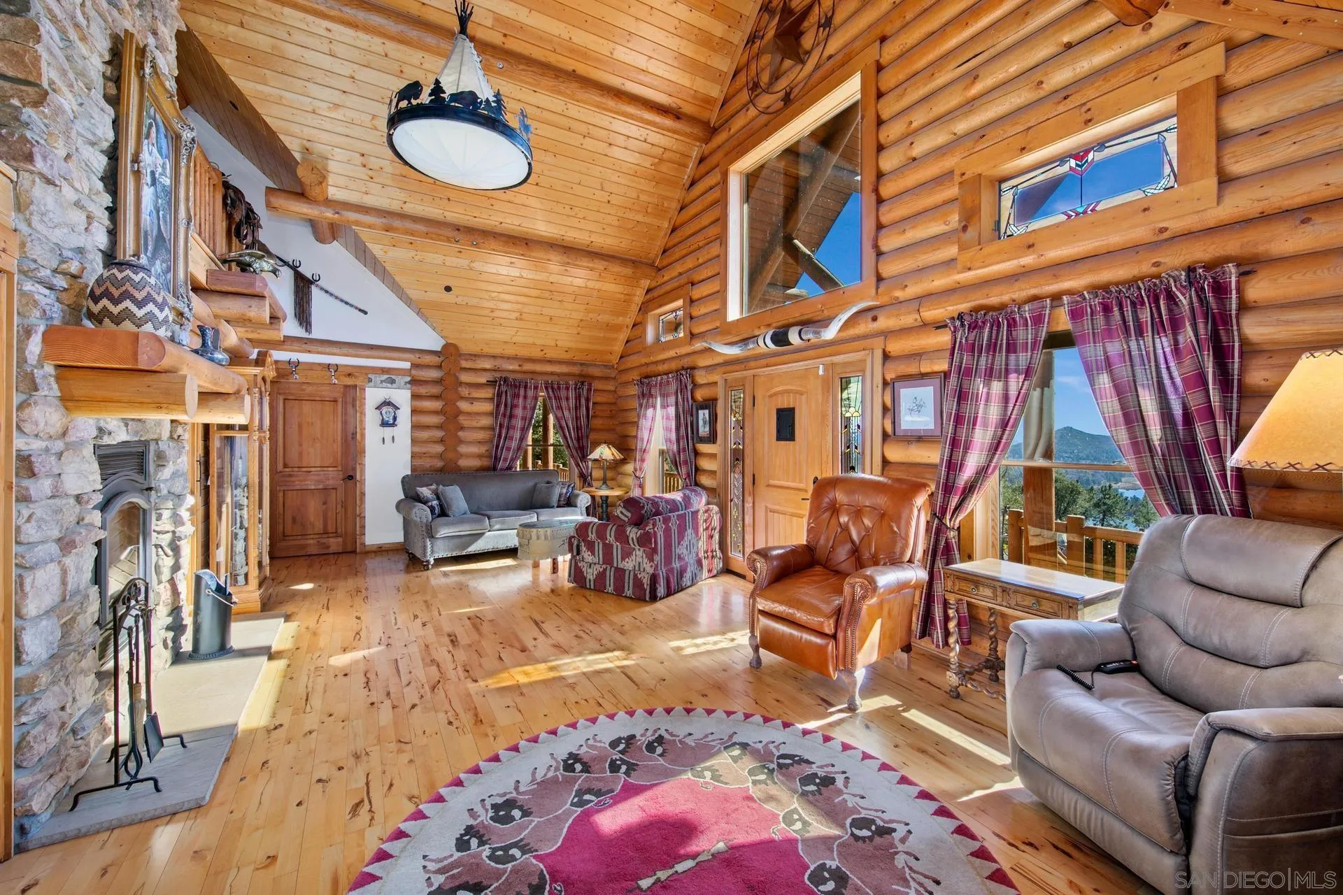 15484 Incapa Road Julian, CA 92036 - Photo 8 of 63 a view of a livingroom with furniture and toys