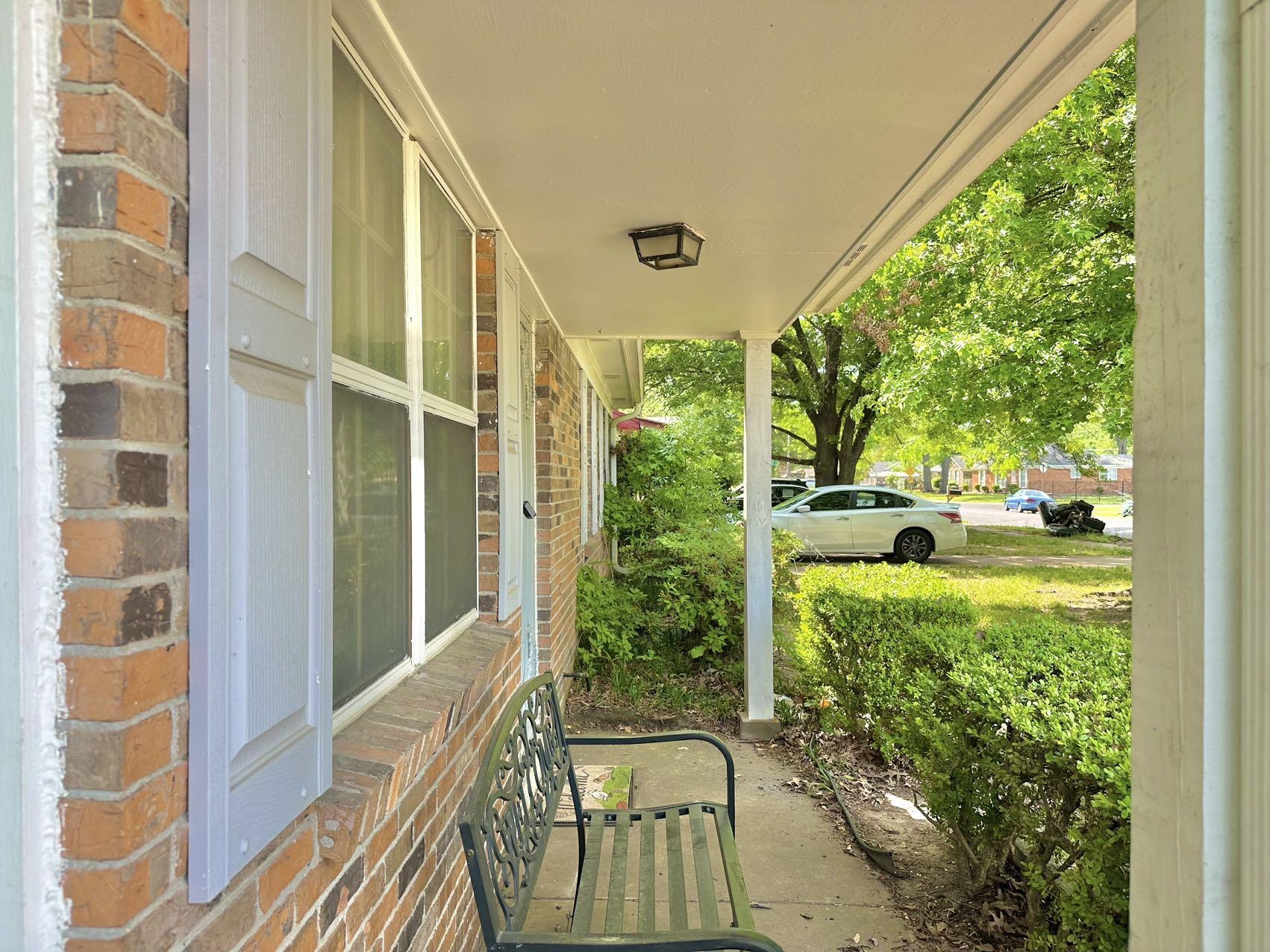 4167 Cochese Road Memphis, TN 38118 - Photo 2 of 14 a view of balcony with floor to ceiling windows and garden