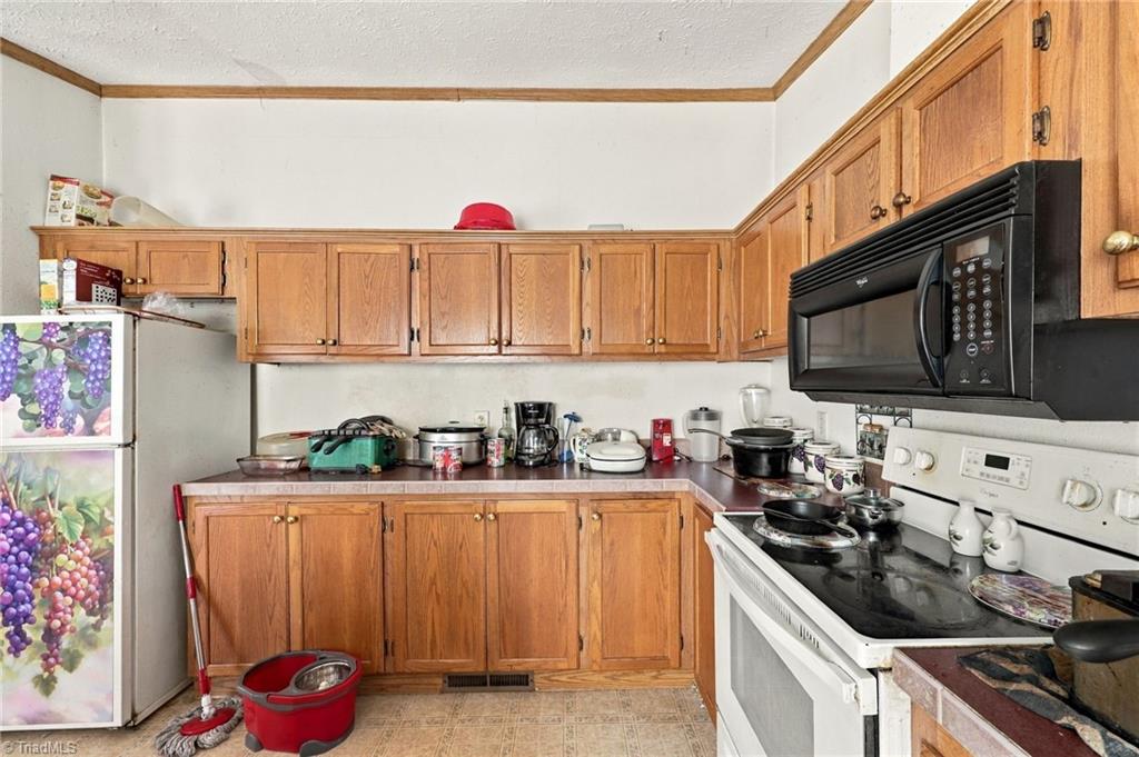 415 Talley Road Reidsville, NC 27320 - Photo 13 of 31 Kitchen with tons of cabinet spaces.