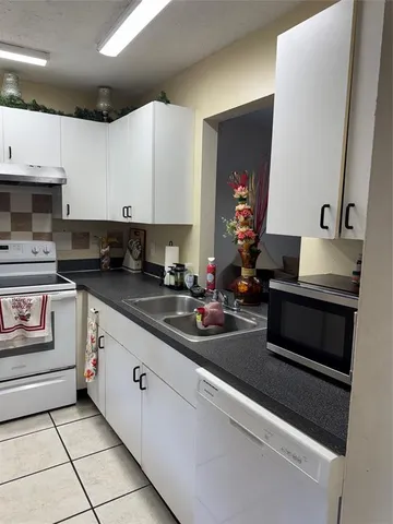 $195,000 | 10577 Royal Palm Boulevard, Unit 10577, Coral Springs, FL 33065