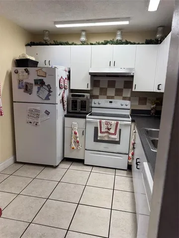 $195,000 | 10577 Royal Palm Boulevard, Unit 10577, Coral Springs, FL 33065