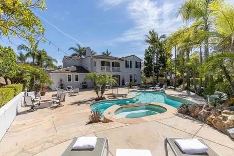 a view of a patio with swimming pool