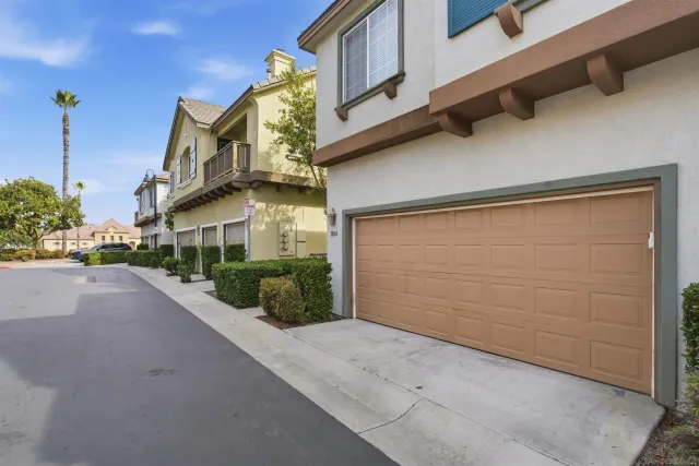 a view of a street with a building in the background