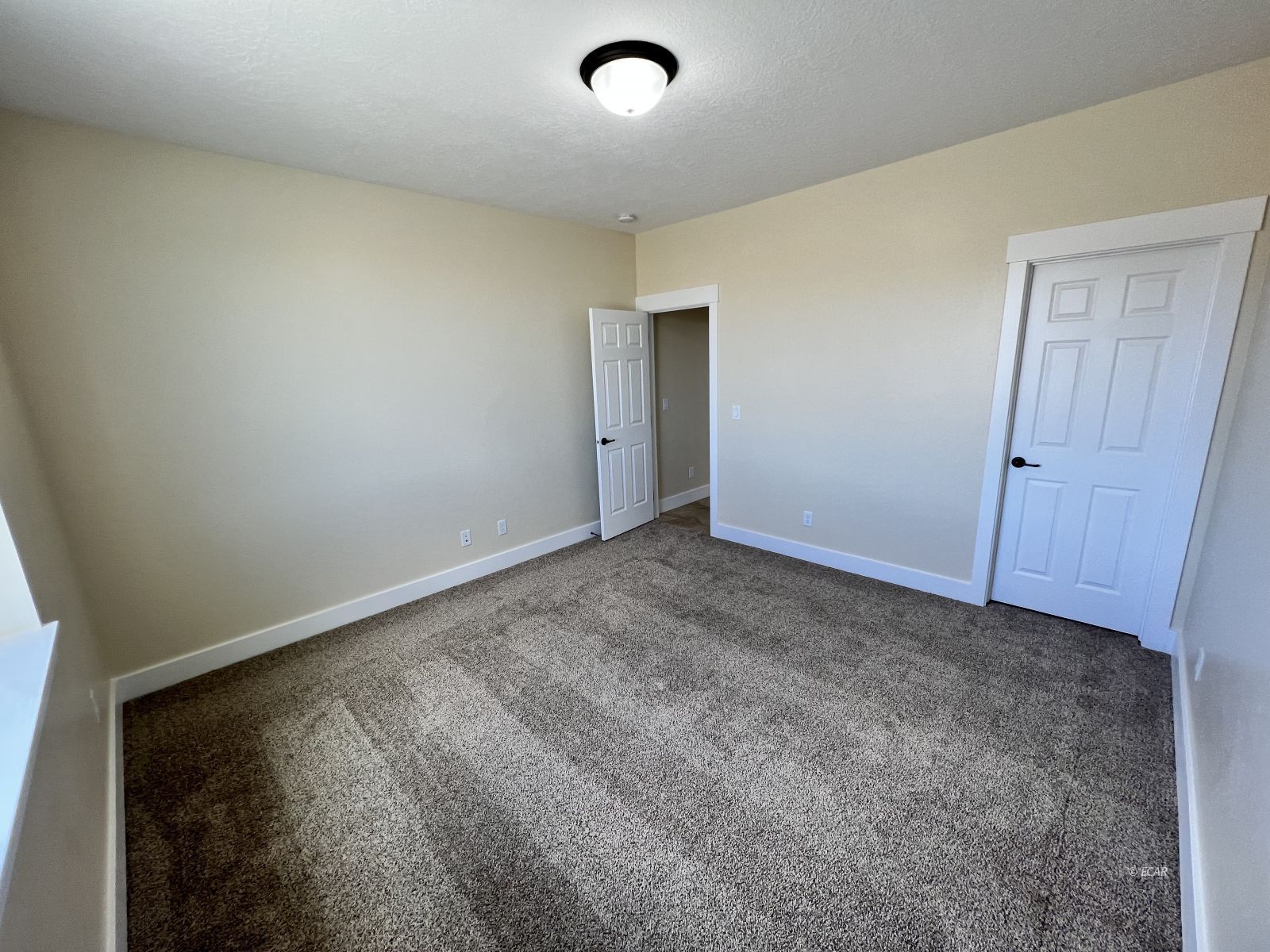 200 Ridgeway Drive Spring Creek, NV 89815 - Photo 18 of 34 an empty room with a natural light