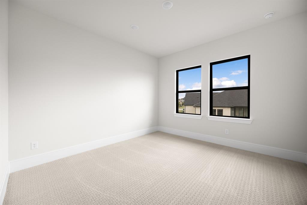 207 Links Court Heath, TX 75126 - Photo 27 of 39 an empty room with a window