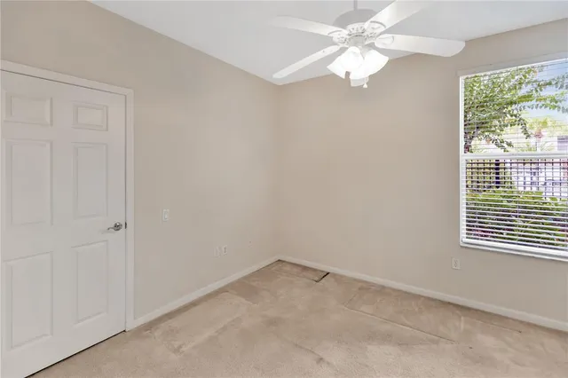 an empty room with a mirror