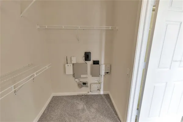 a bathroom with a glass shower door