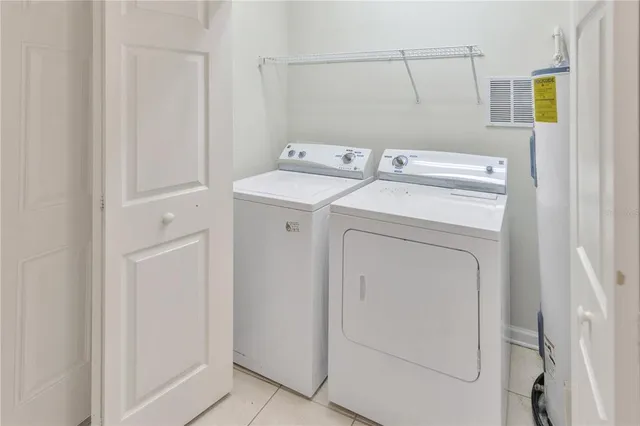 a view of a room that has a bed