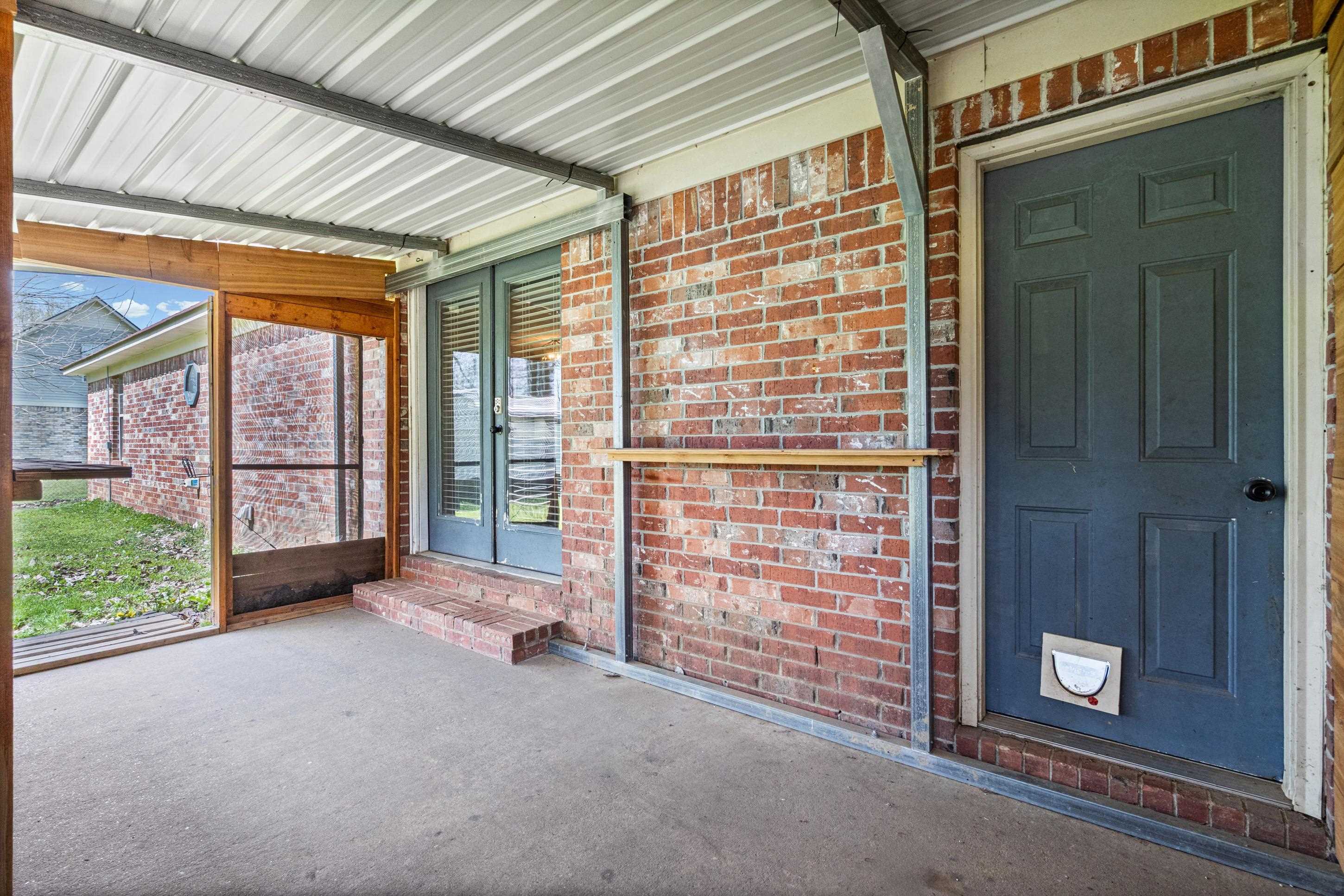 511 Rae Drive Munford, TN 38058 - Photo 18 of 30 a view of an outdoor space and porch with furniture