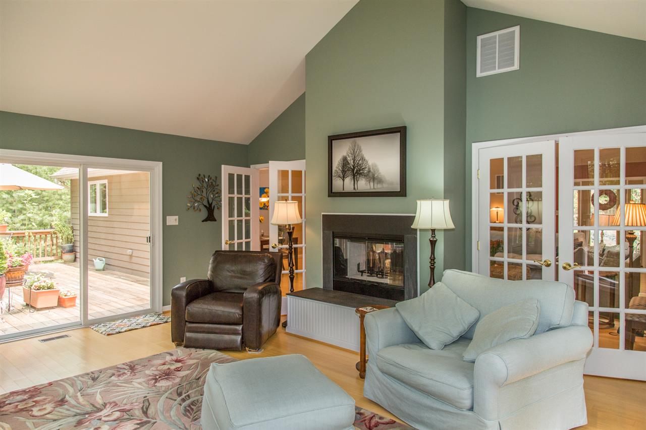 50 Oak Grove Road Palmyra, VA 22963 - Photo 15 of 50 a living room with furniture and a fireplace