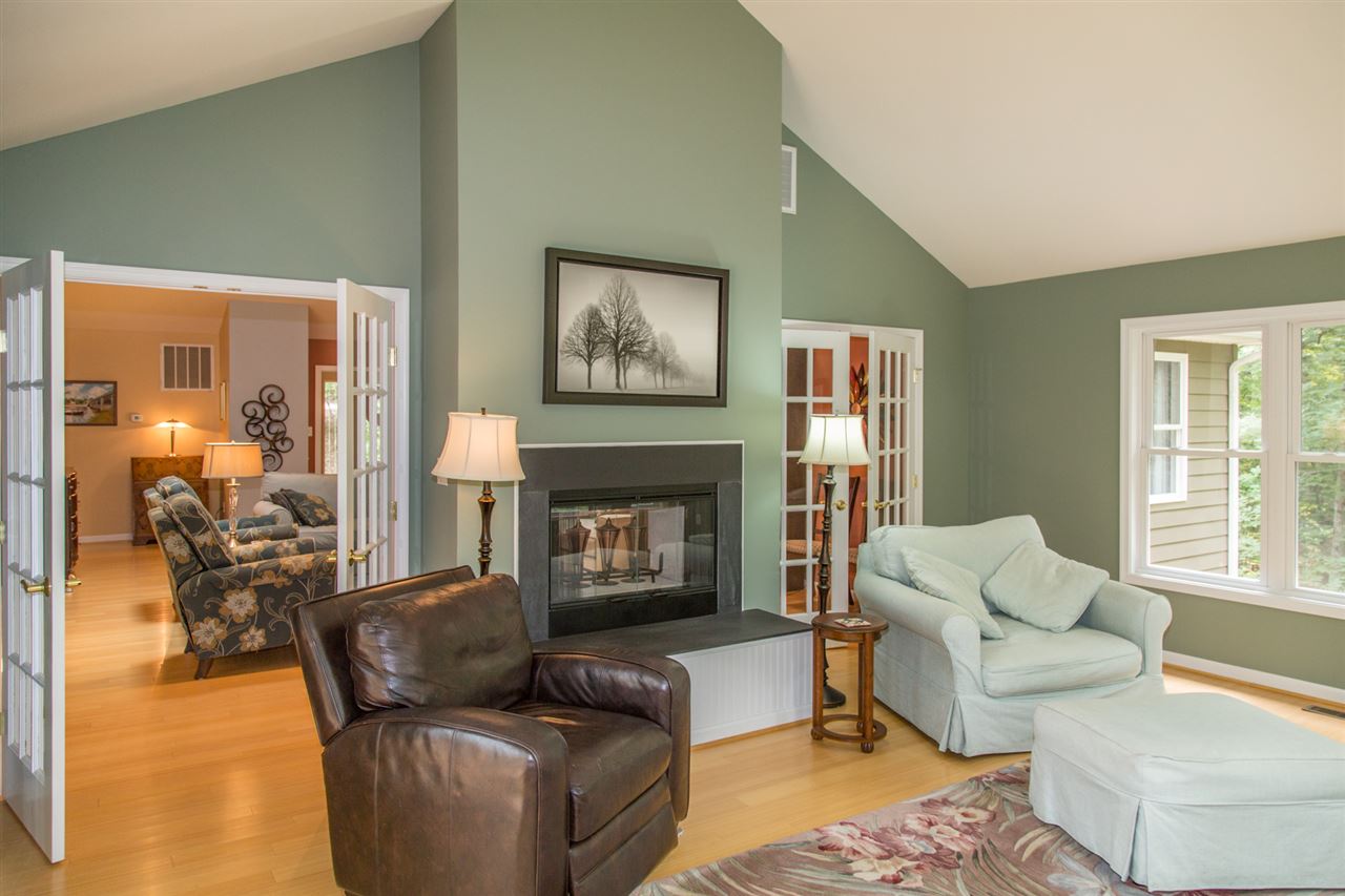 50 Oak Grove Road Palmyra, VA 22963 - Photo 18 of 50 a living room with furniture and a fireplace