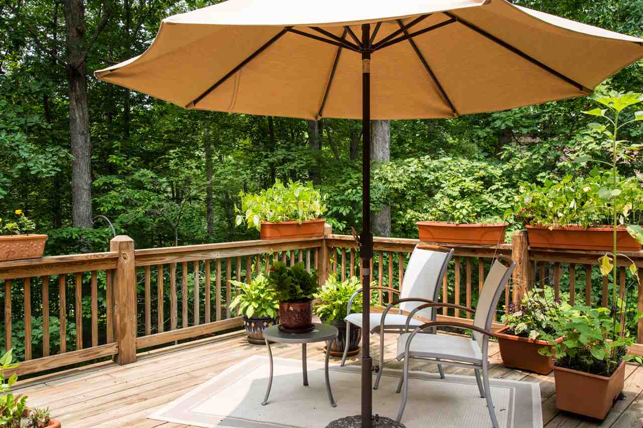 50 Oak Grove Road Palmyra, VA 22963 - Photo 20 of 50 a view of a chair and table on the wooden floor