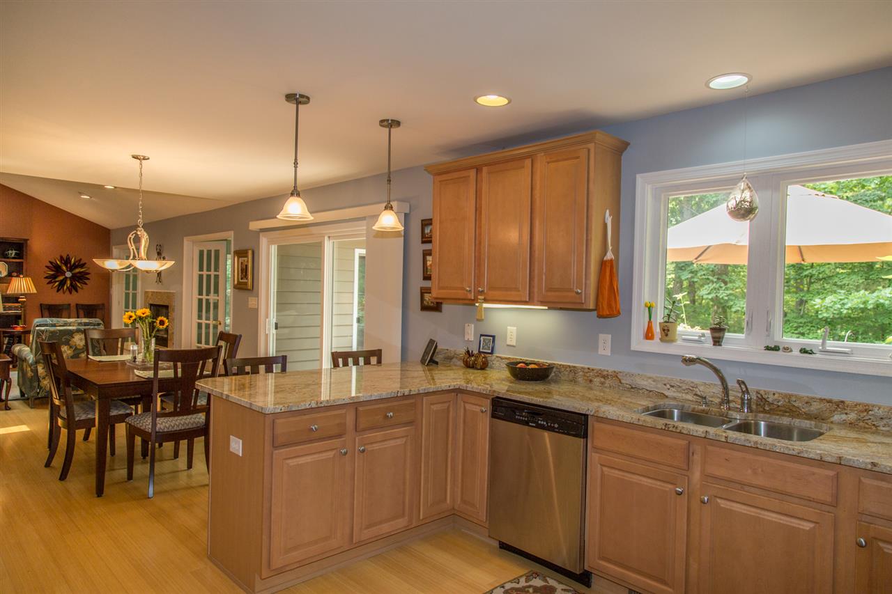 50 Oak Grove Road Palmyra, VA 22963 - Photo 26 of 50 a kitchen with lots of counter top space and dining table