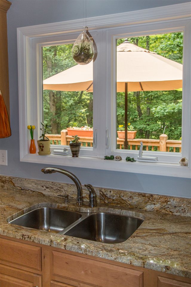50 Oak Grove Road Palmyra, VA 22963 - Photo 27 of 50 a view of a kitchen counter a sink and couch