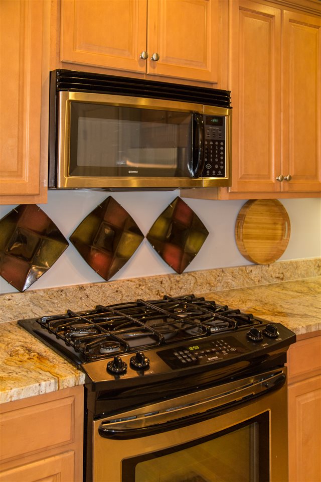 50 Oak Grove Road Palmyra, VA 22963 - Photo 29 of 50 a stove top oven sitting inside of a kitchen