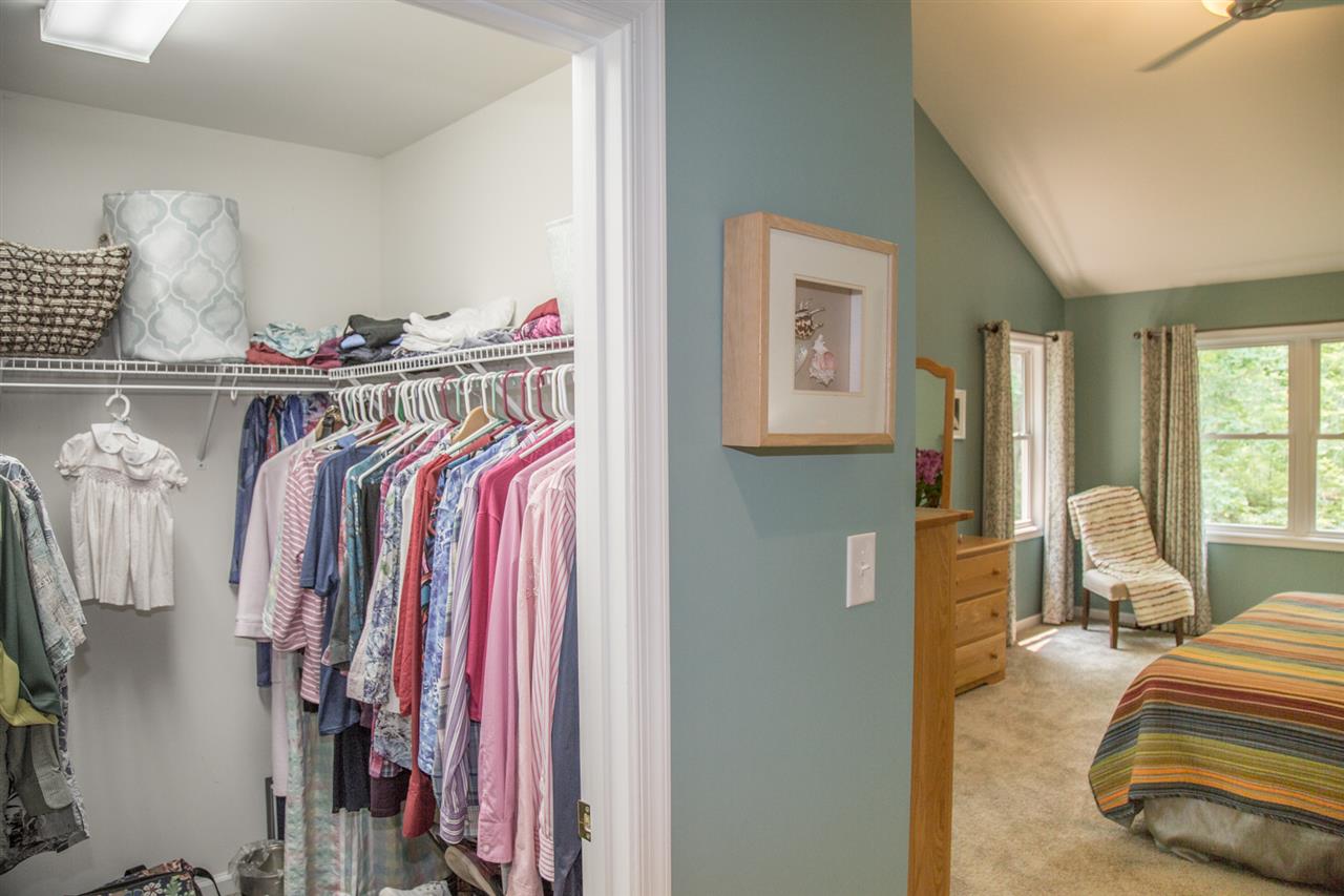 50 Oak Grove Road Palmyra, VA 22963 - Photo 32 of 50 a view of walk in closet with clothes and shoes